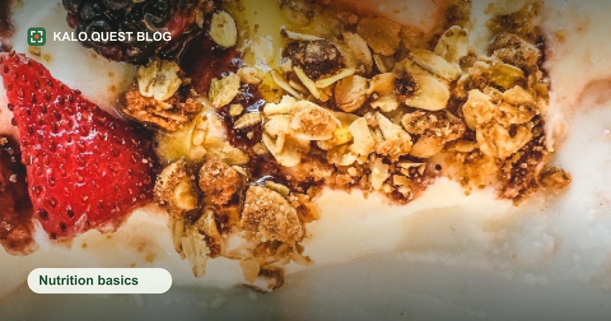 A close-up of plain yogurt topped with granola, sliced strawberries and a blackberry. Kalo.Quest blog.